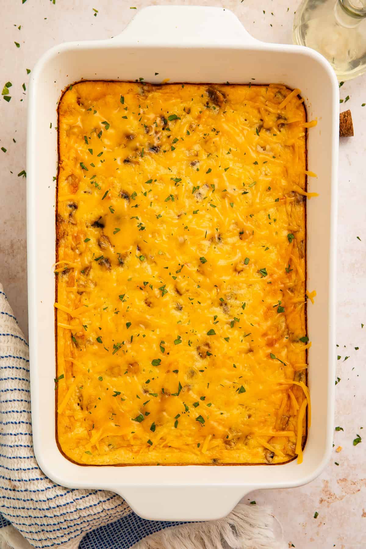 Top down view showing the melted cheese on top of a high protein egg bake.