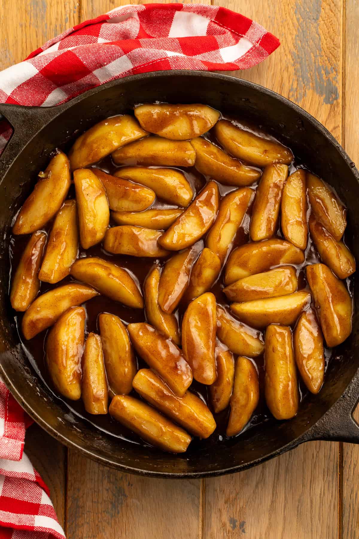 Homemade Cracker Barrel fried apples in a cast-iron skillet.