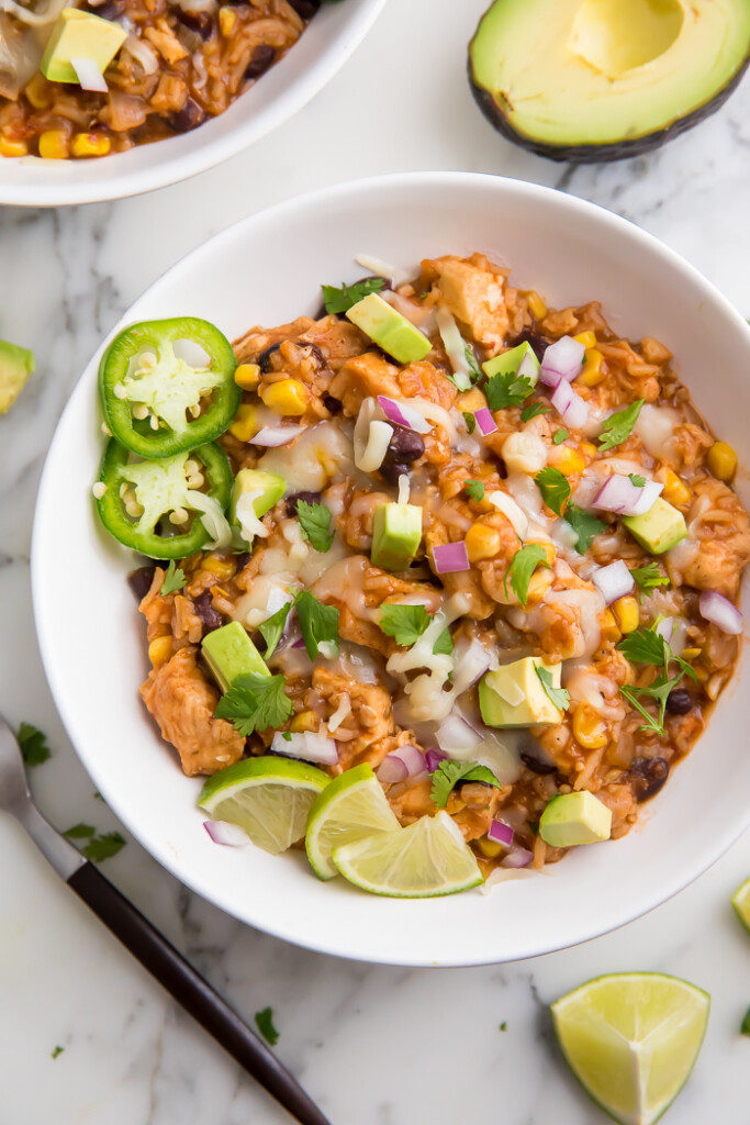 An instant pot burrito bowl with chicken served in a white bowl.