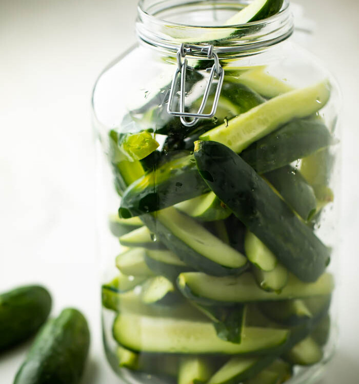 Homemade pickles in a glass jar