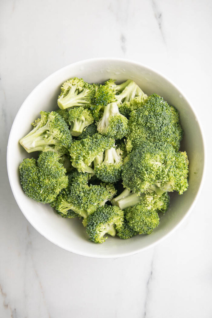 Uncooked broccoli in a bowl