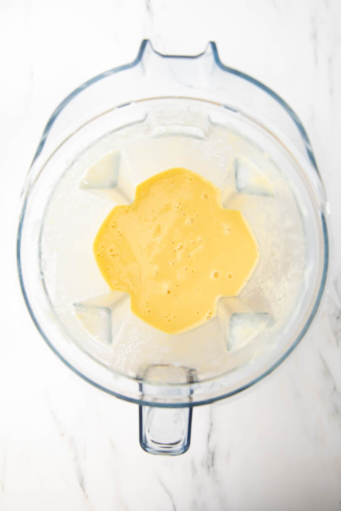 Blended mango pineapple smoothie
