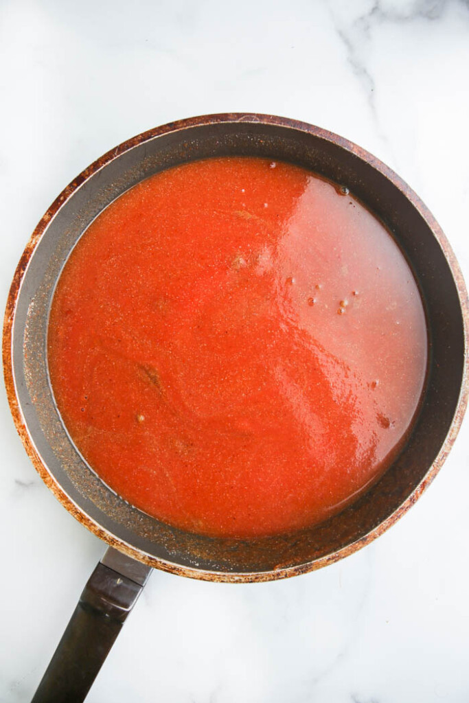 Taco sauce cooking in a skillet
