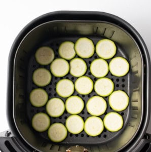 Zucchini chips in air fryer basket
