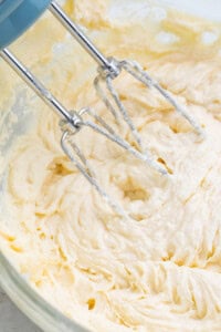 Keto cream cheese being mixed in a large bowl