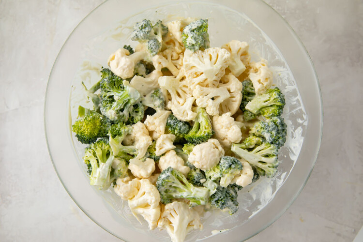 Cauliflower and broccoli in a large glass bowl