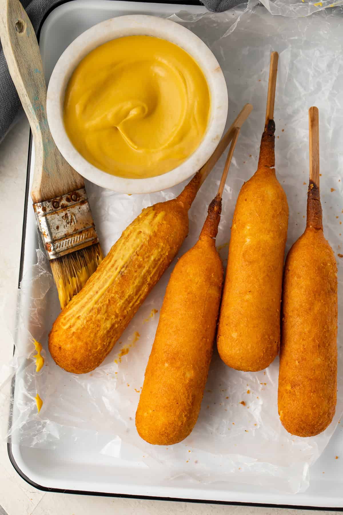 Air fryer corn dogs on a tray
