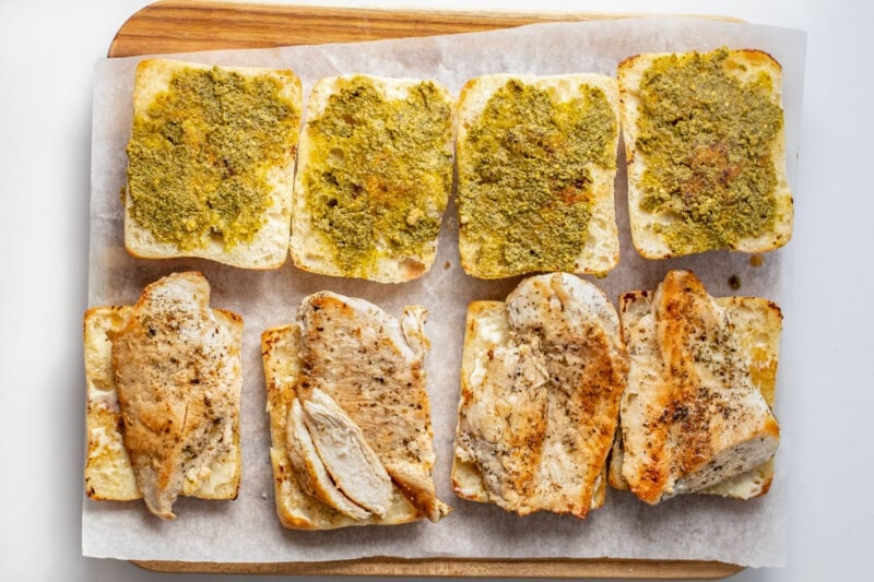 Chicken cutlets added to toasted ciabatta rolls with mayo.