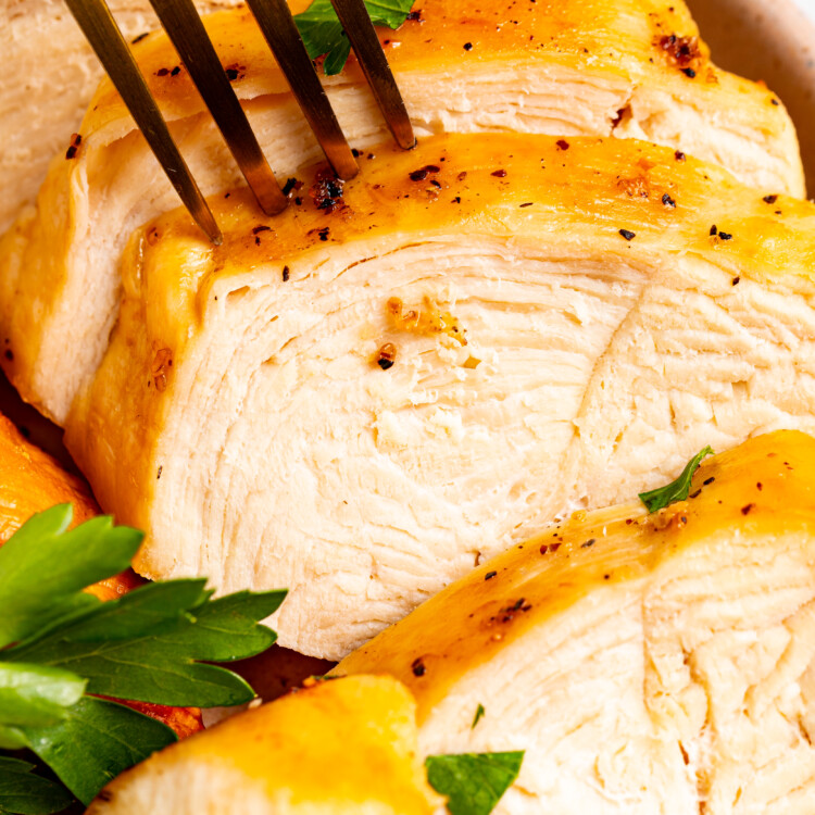 Close-up image of sliced chicken breast.