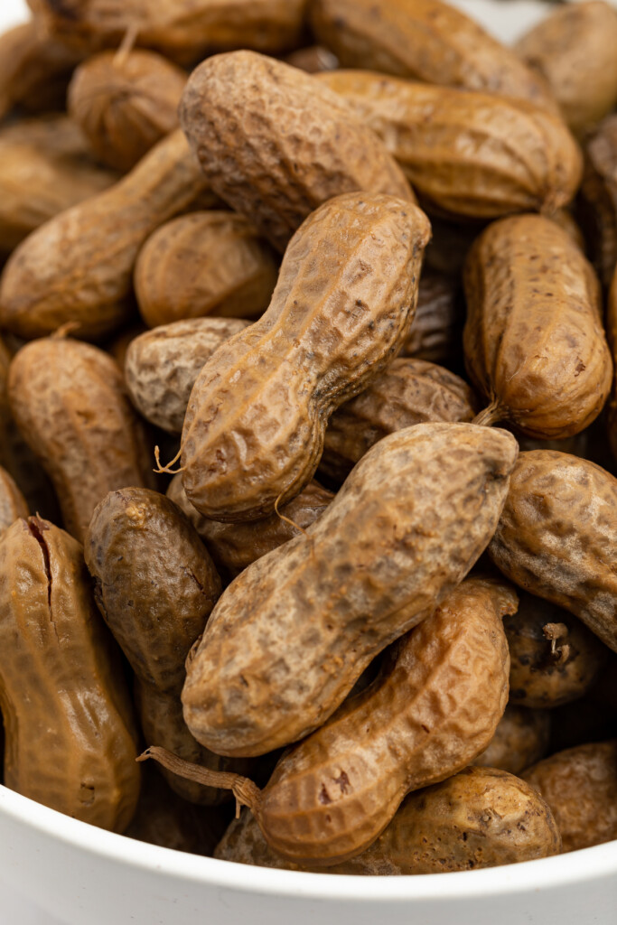 close up image of instant pot boiled peanuts in a bowl