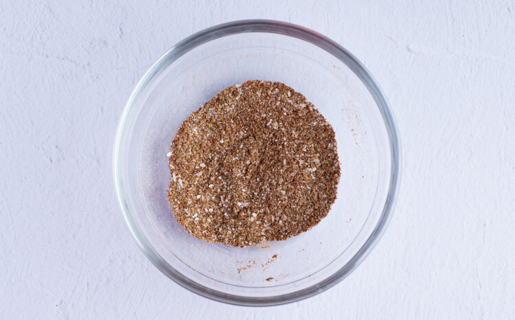 Dry rub spice mixture in a large glass bowl