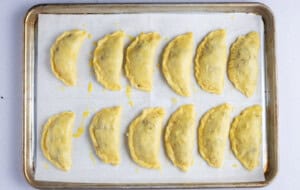Keto empanadas on a baking sheet