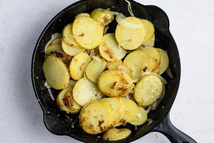 Smothered potatoes in large skillet