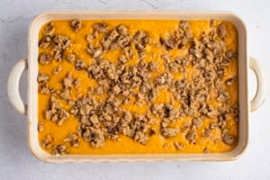 Uncooked sweet potato pudding in baking dish