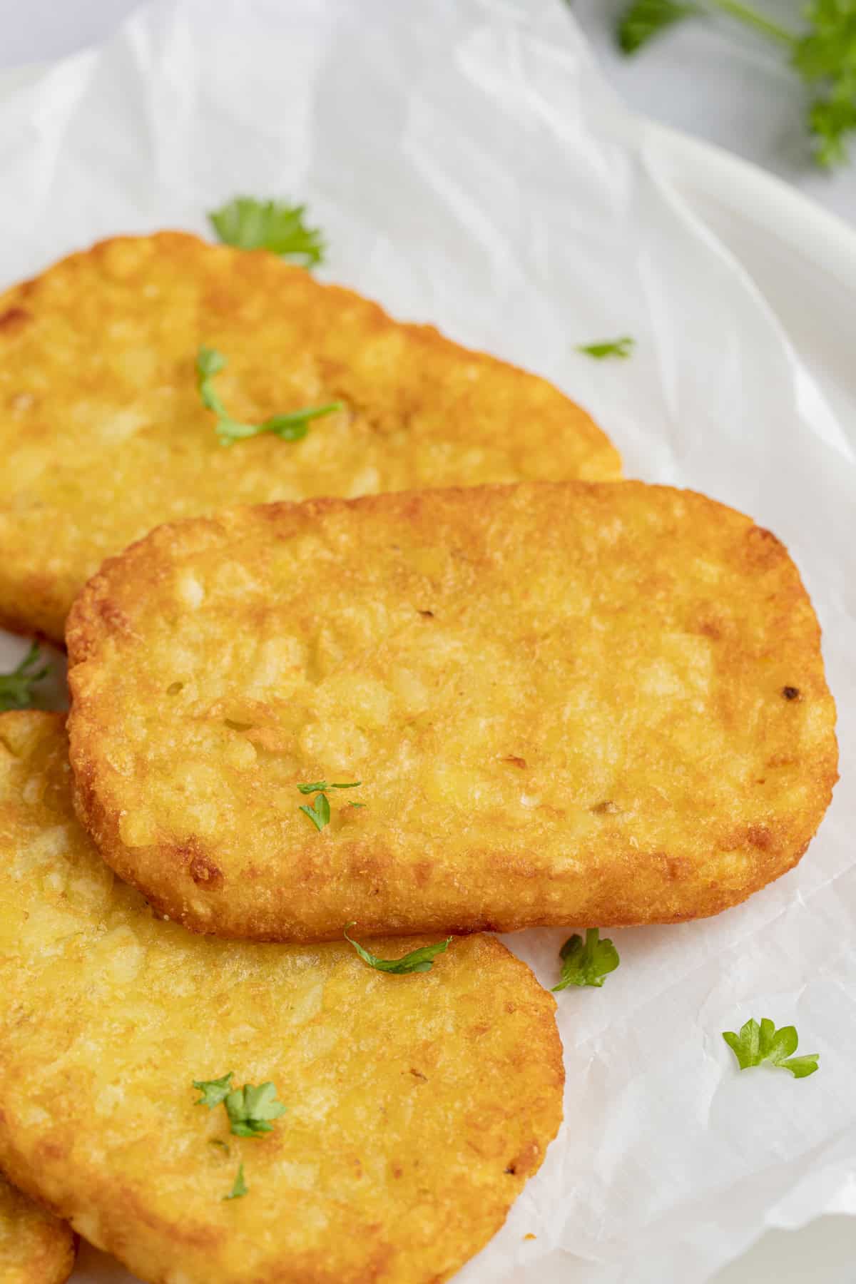 Hashbrowns cooked in the air fryer and served on a plate
