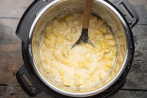 Overhead view of creamy Instant Pot cheesy potatoes in Instant Pot.