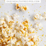 Pin graphic for buttery vegan popcorn.