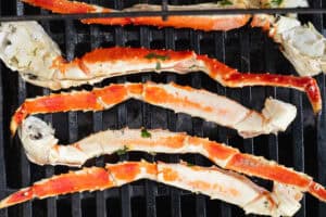 King crab legs on grill.