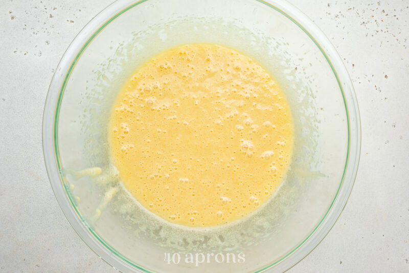 Wet ingredients mixed with eggs to form the base of the dairy free brownies.