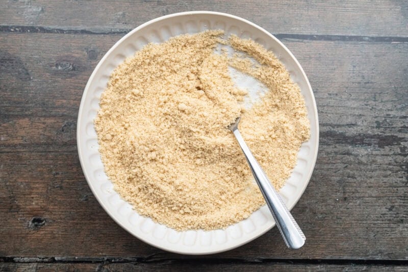 Overhead view of almond flour parmesan breading mixture for keto chicken nuggets.