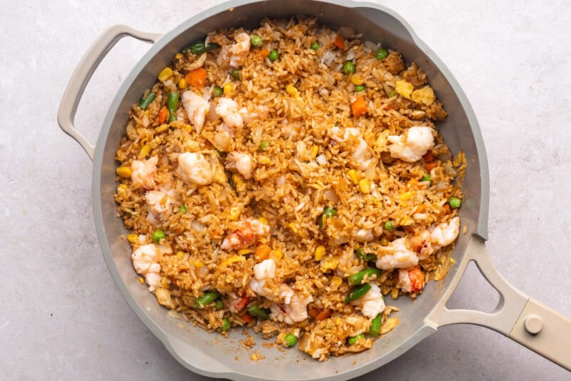 Lobster fried rice in a large skillet.