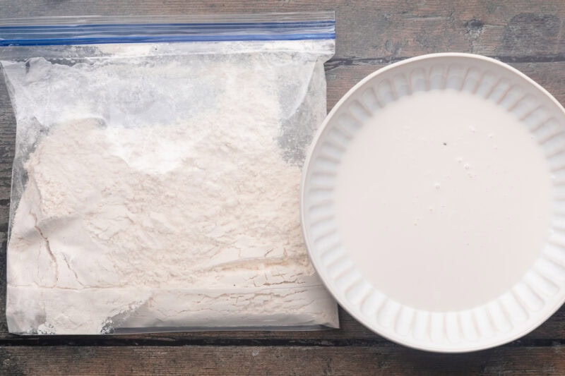Buttermilk and breading mixture for truffle honey chicken.