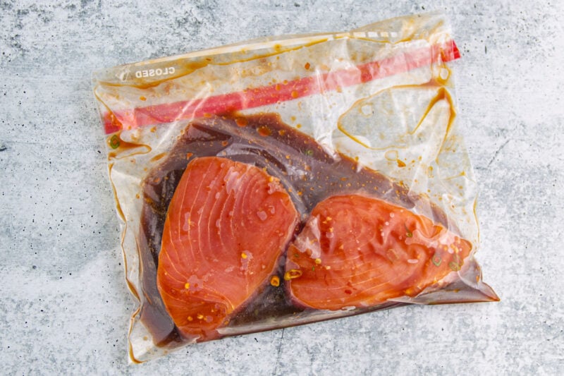 Ahi tuna steaks in a ziploc bag with marinade.