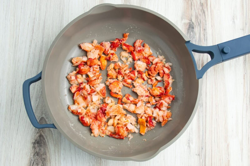 Lobster meat in large skillet.