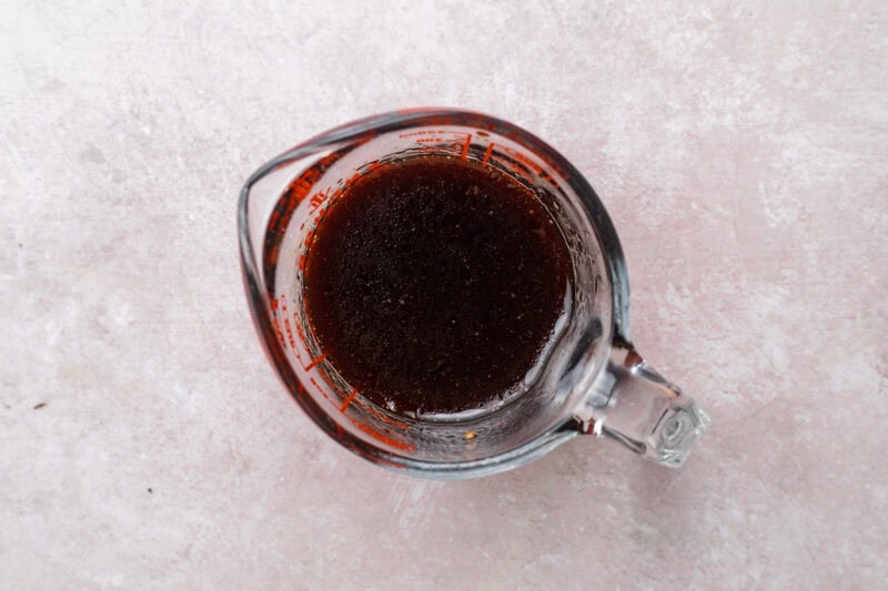 Marinade mixture of garlic, soy sauce, honey, red wine vinegar, and olive oil.