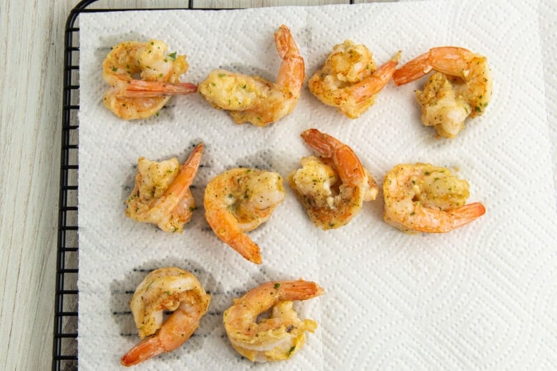 Shrimp on wire cooling rack.