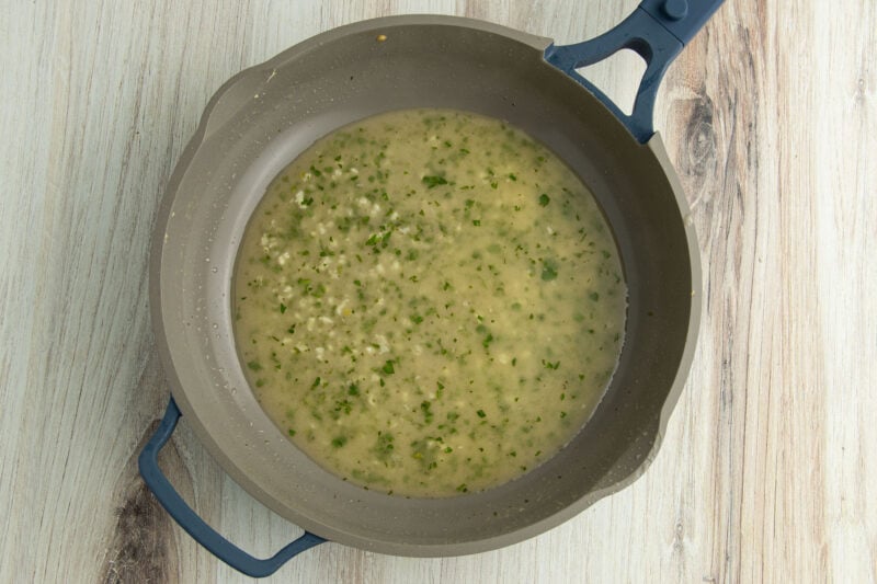 Butter and garlic in skillet.