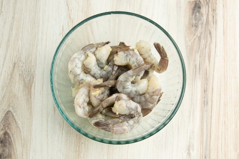Shrimp in medium glass mixing bowl.