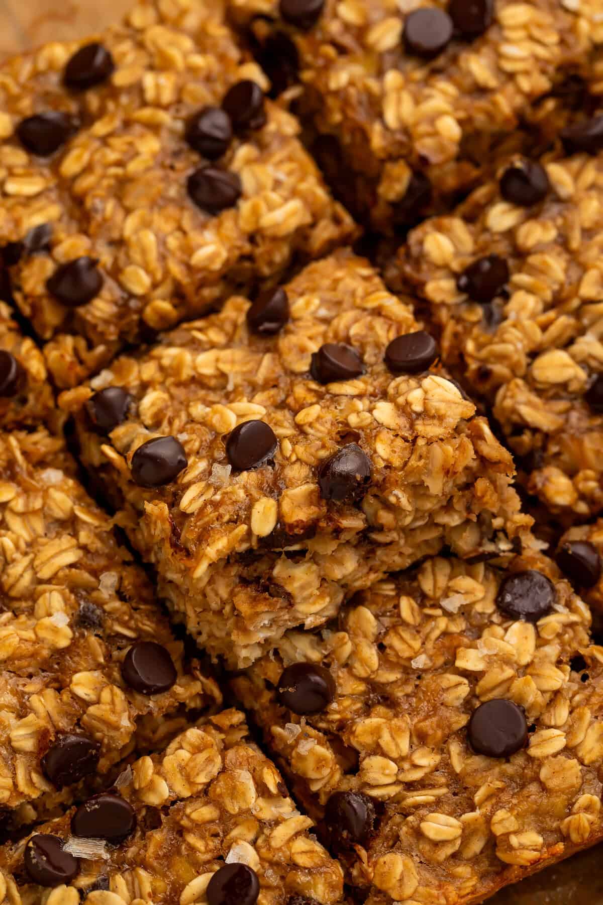 Close up of cut oatmeal bars with chocolate chips.