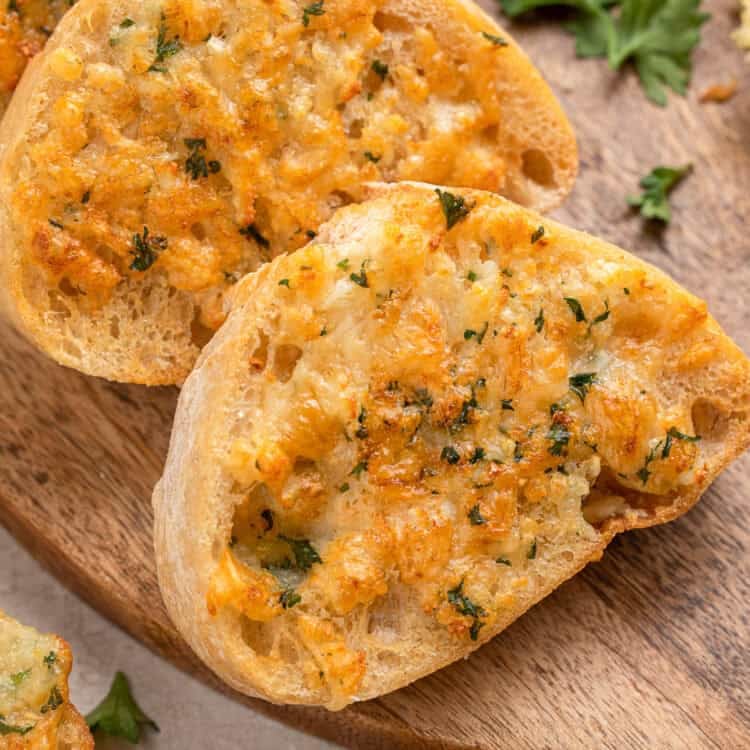 Crispy air fryer garlic toast with melted cheese and fresh parsley