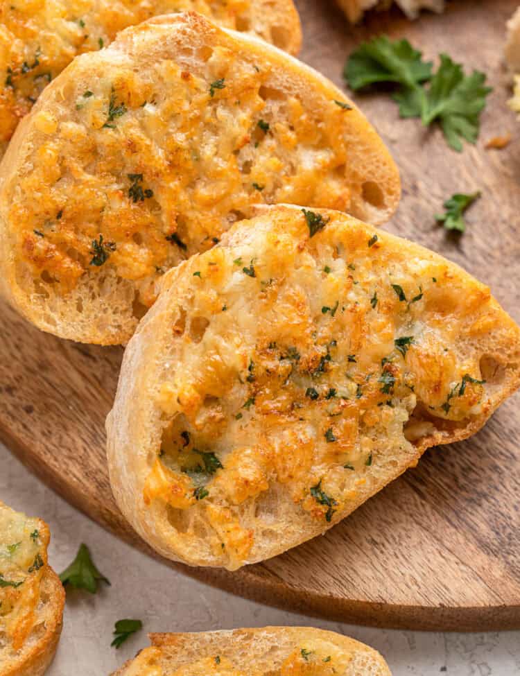Crispy air fryer garlic toast with melted cheese and fresh parsley