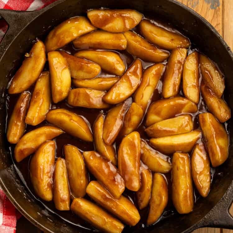 Homemade Cracker Barrel fried apples in a cast-iron skillet.