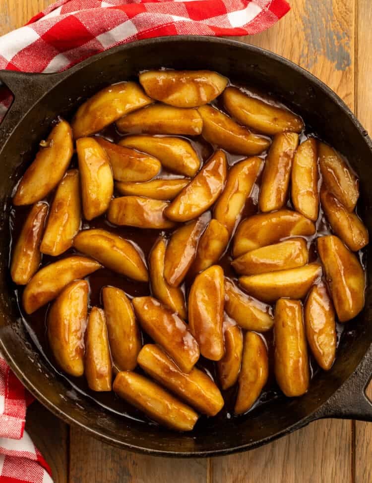 Homemade Cracker Barrel fried apples in a cast-iron skillet.