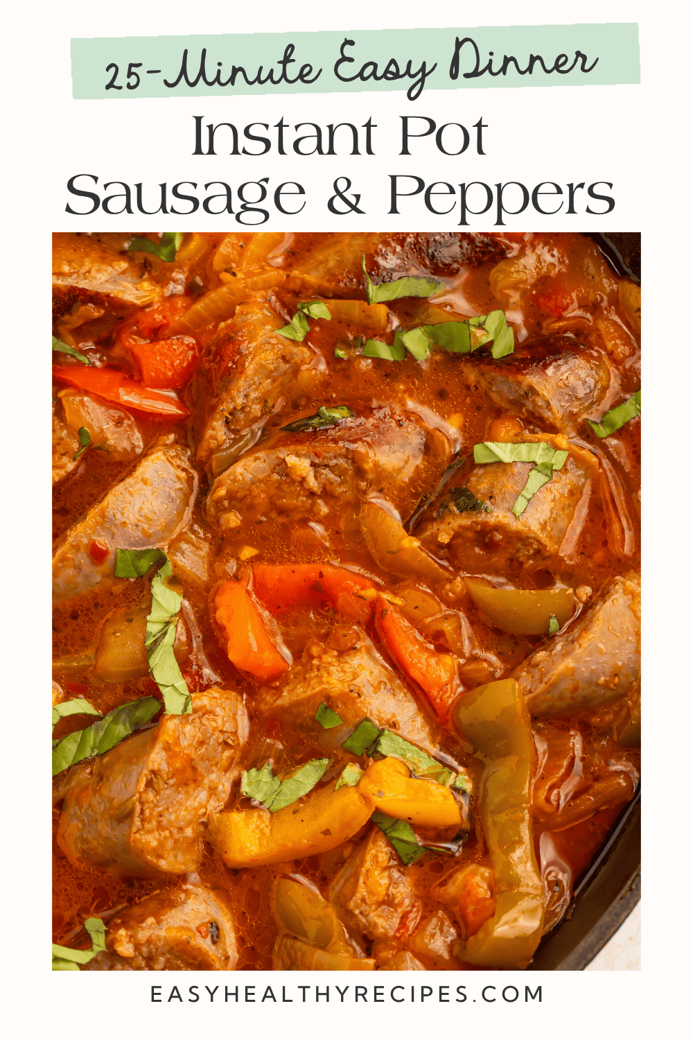 Instant Pot sausage and peppers with sliced sausage, peppers, onions, and basil in tomato sauce.