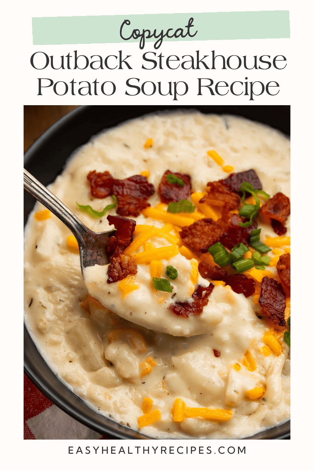 Copycat Outback Steakhouse potato soup graphic showing a spoonful of thick soup with bacon, cheese, and green onions.