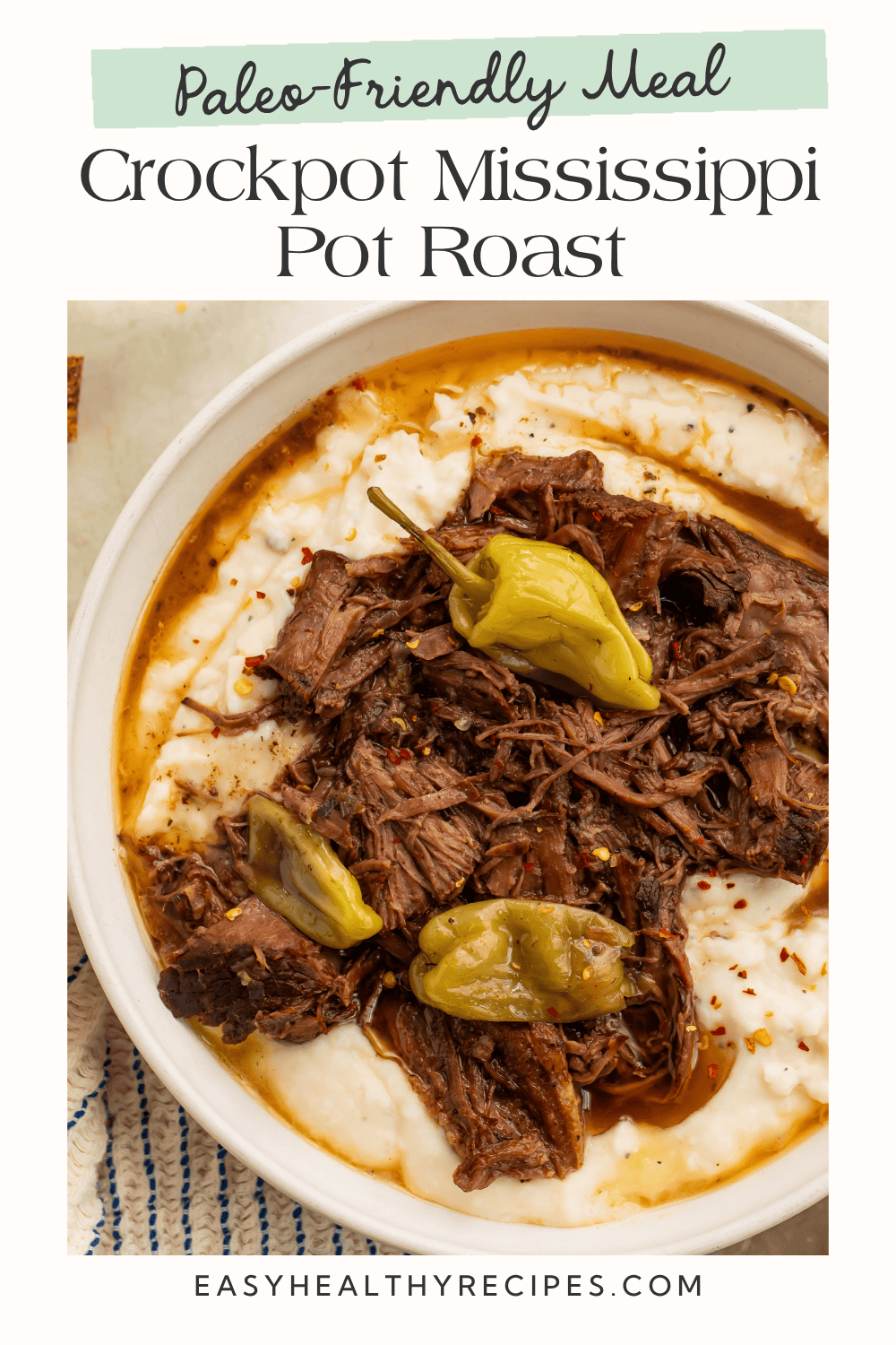 Paleo-friendly meal graphic featuring shredded Crockpot Mississippi Pot Roast with pepperoncini over mashed potatoes.