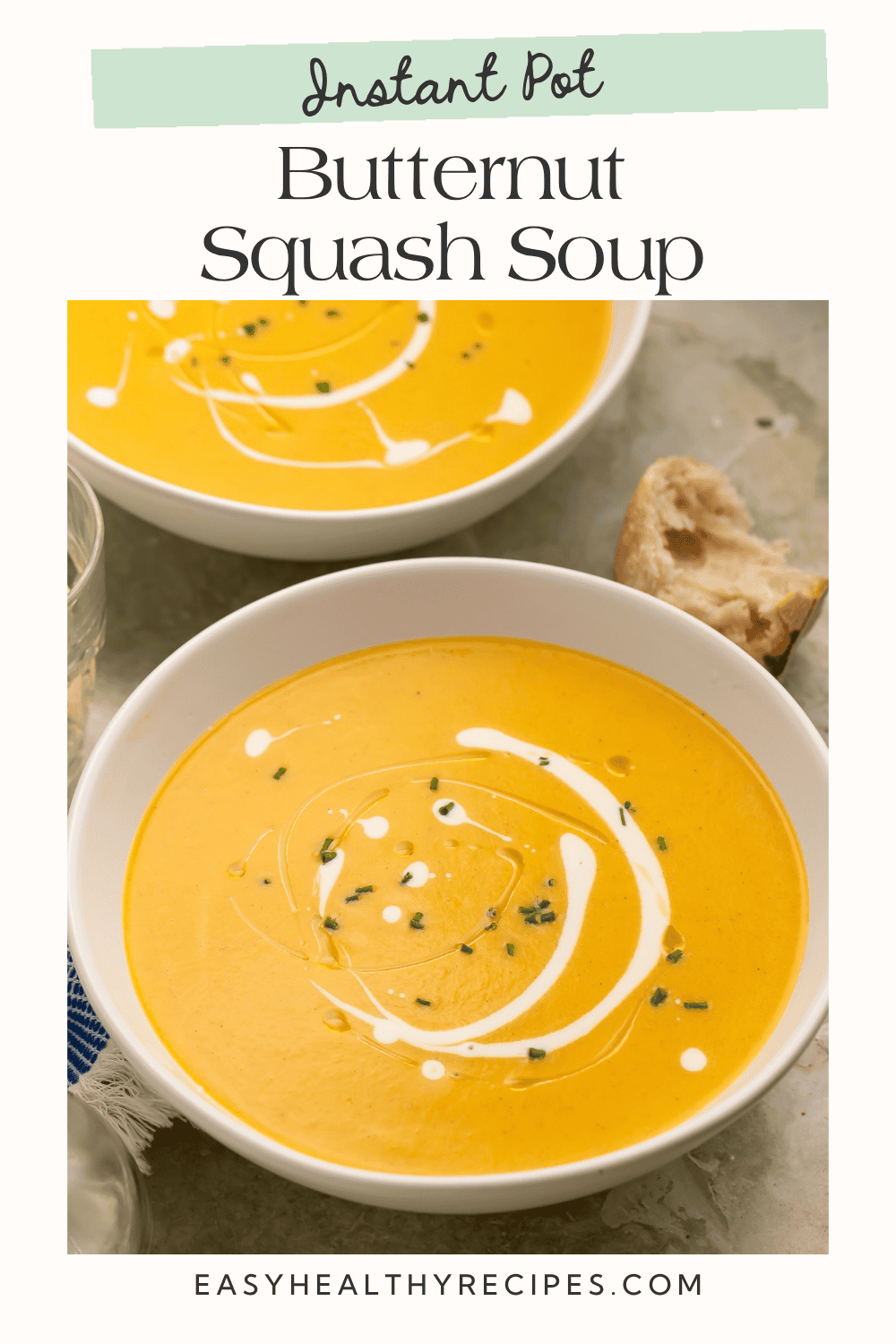 Two bowls of creamy soup with chives and crusty bread, beneath the title “Instant Pot Butternut Squash Soup.”