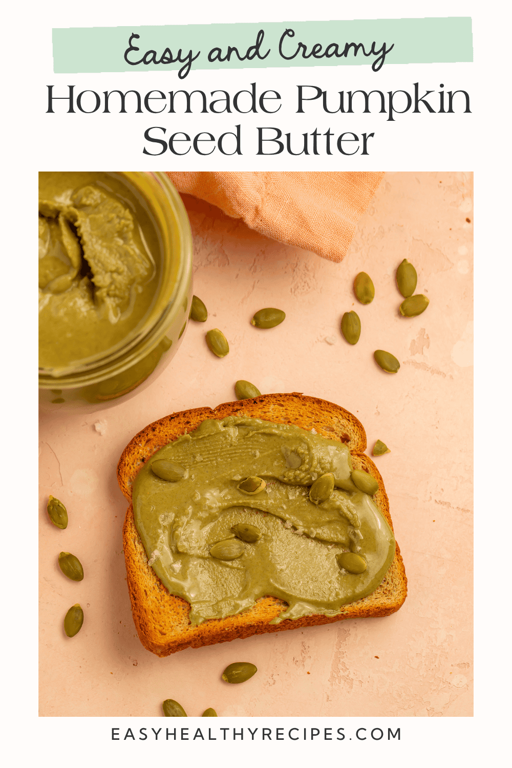 Easy and creamy homemade pumpkin seed butter spread on toast and topped with shelled pumpkin seeds.
