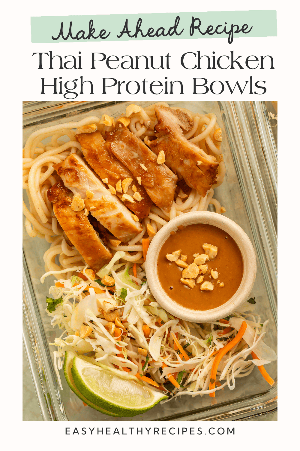 Make-ahead Thai peanut chicken bowl with sliced chicken, rice noodles, cabbage and carrot slaw, peanut sauce, and lime.