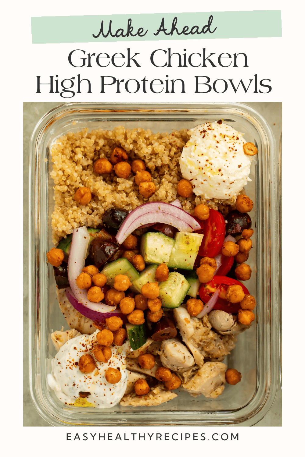 Greek chicken bowl with farro, cucumber-tomato salad, chickpeas, and creamy toppings.